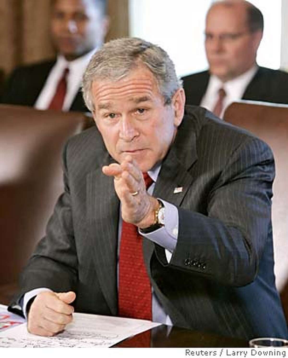 U.S. President George W. Bush holds a Cabinet Meeting in the Cabinet Room of the White House, October 24, 2005. REUTERS/Larry Downing 0