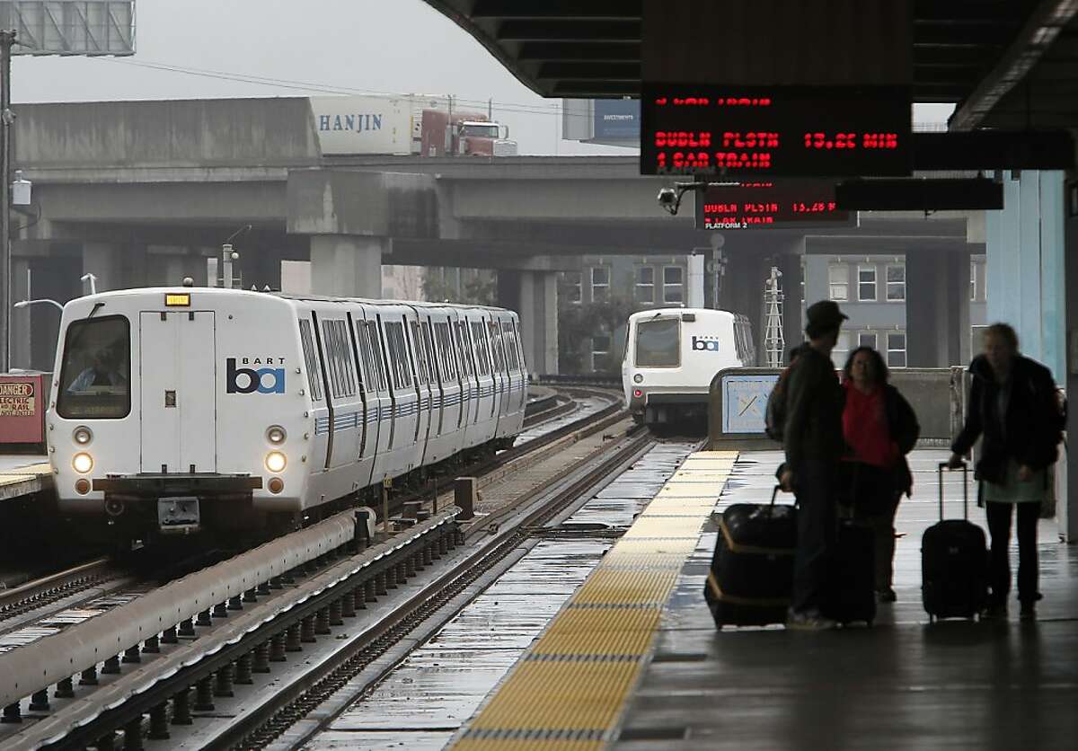 BART trains coming and going from the West Oakland station, during this rain soaked week, in Oakland, Ca., on Thursday March 15, 2012. It seems when it rains, BART struggles to stay on schedule. While BART officials say the latest storms have not caused any significant delays, passengers seem to think otherwise.