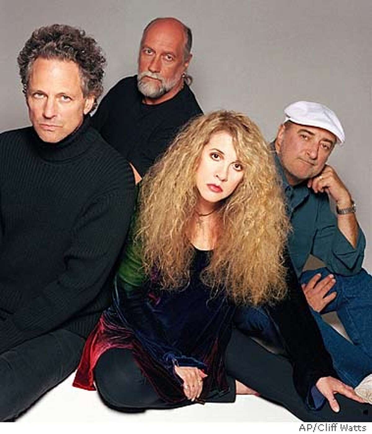 ** ADVANCE FOR WEEKEND EDITIONS MAY 1-4 **The rock group Fleetwood Mac poses together in this undated promotional photo for its new album "Say You Will," its first with new material since 1987. Current members of the band, from left, are, Lindsey Buckingham, Mick Fleetwood, Stevie Nicks and John McVie. (AP Photo/Cliff Watts)