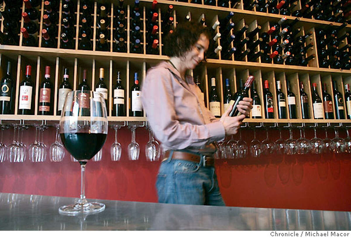barbites_cav_047_mac.jpg Owner Pamela Busch with an extensive wine list. CAV Wine Bar along Market St. between Franklin and Gough Sts. feature for 96 Hours, Bar Bites. Photographed in, San Francisco, Ca, on 4/11/07. Photo by: Michael Macor/ The Chronicle