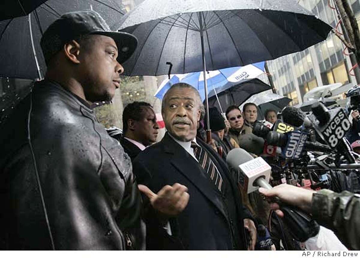 Rev. Al Sharpton, center, gestures toward Linzell Vaughn, left, father of Rutgers sophomore basketball center Kia Vaughn, as they face the press outside CBS headquarters in New York before they met with CBS executive Les Moonves, Thursday, April 12, 2007, about remarks made by radio personality Don Imus. CBS Radio, which has suspended Imus for two weeks without pay beginning next week, said it would "continue to speak with all concerned parties and monitor the situation closely." (AP Photo/Richard Drew)