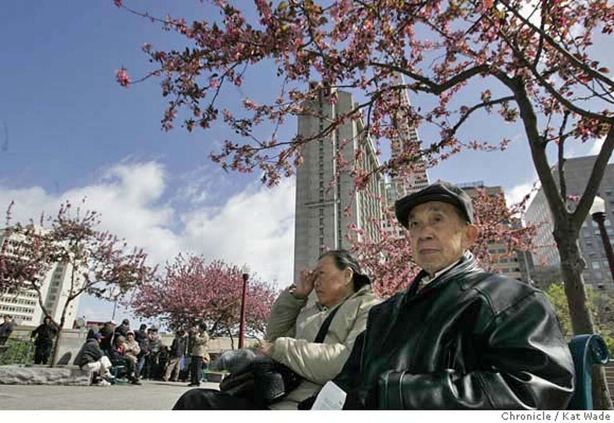 CITY_COLLEGE00_050_KW.jpg On Tuesday March 27, 2007 (L to R) Mei Rong Yu Li, 86, and her husband, Heragun Li, 91, sit on a beneath the cherry blossoms in Portsmouth Park in Chinatown where they say they have come every day since 1988 for sunshine and fresh air . City College plans to build a 17 story satellite campus directly across the street (which would tower through the open blue sky space in the left of the photo) which opponents say would cast a shadow on the park. Kat Wade/The Chronicle Mandatory Credit for San Francisco Chronicle and photographer, Kat Wade, No Sales Mags out