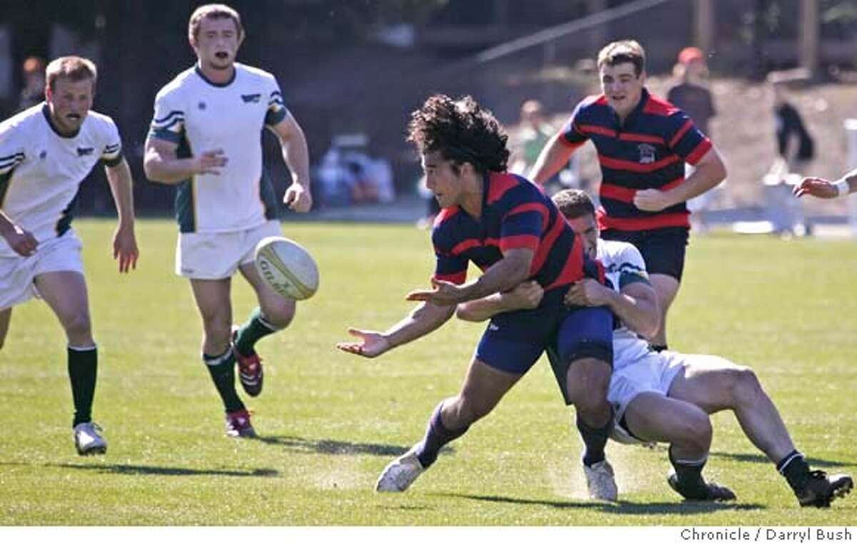 stmarysrugby_0002_db.JPG St. Mary's College's Volney Rouse passes the ball to a teammate before being tackled. St. Mary's College goes on to defeat California State University Sacramento 68-13 in rugby at St. Mary's in Moraga, CA, on Friday, March, 16, 2007. photo taken: 3/16/07 Darryl Bush / The Chronicle ** Volney Rouse, roster (cq) MANDATORY CREDIT FOR PHOTOG AND SF CHRONICLE/NO SALES-MAGS OUT