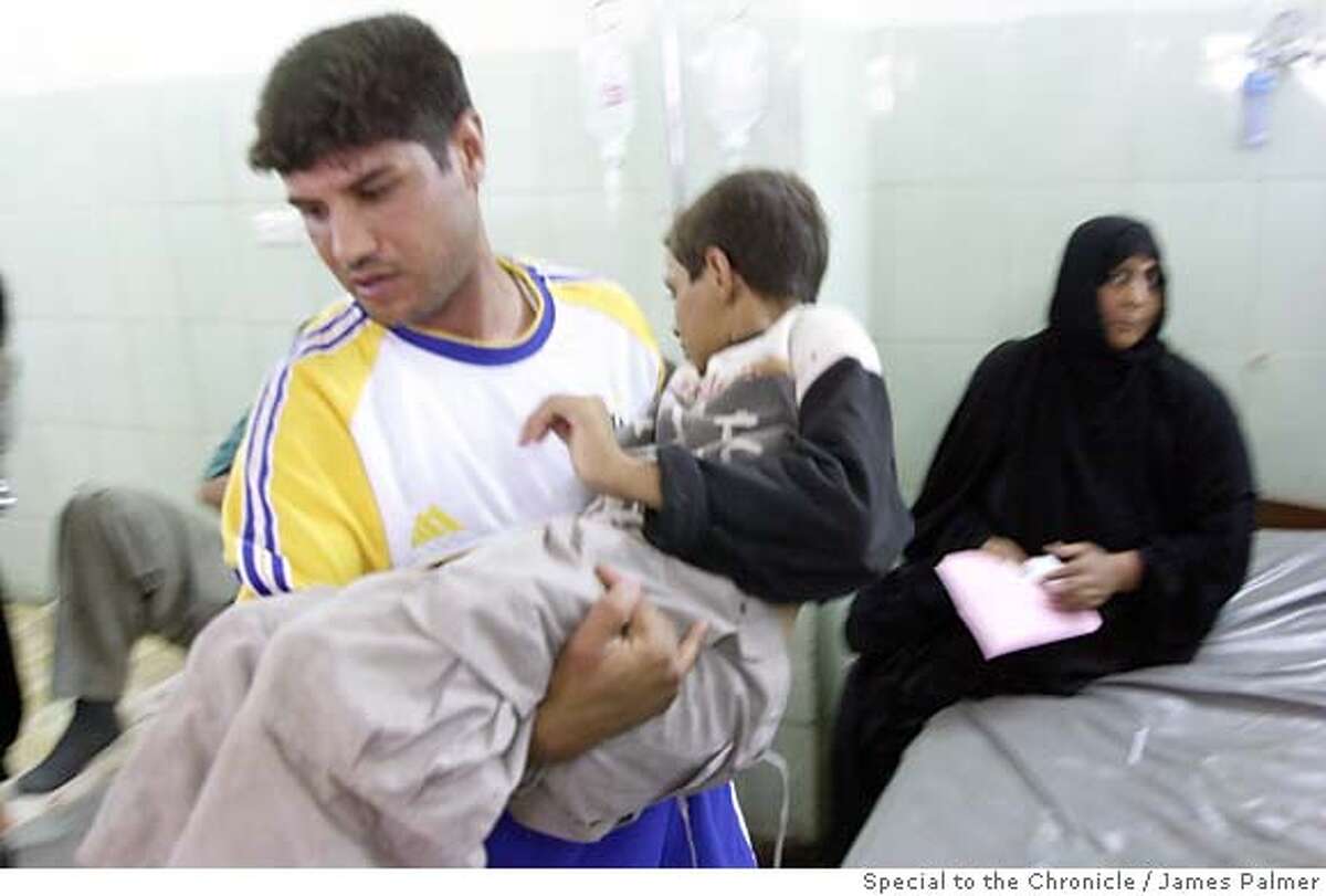An Iraqi boy awaits medical treatment in the emergency room at Yarmouk Hospital in Baghdad, Iraq, on September 28, 2006. Psychiatrists here are warning of a disturbing spike in mental health disorders among Iraq�s population, particularly children, as terrorism, an armed insurrection, and a bloody sectarian divide has gained a stranglehold on the country and its people. The escalating psychiatric caseloads are compounded by Iraq�s lack of mental health workers, facilities, and services leaving many people throughout the country with little or no treatment. The striking imbalance between the ongoing violence in Iraq and deficiencies in its mental health care system has triggered alarm among Iraq�s psychiatrists who said the consequences may permanently damage generations of this distressed nation. James Palmer / Special to The Chronicle Ran on: 03-19-2007 An Iraqi boy awaits treatment in the emergency room at Yarmouk Hospital in Baghdad. A study of 10,000 primary school students found at least 70 percent suffered from trauma-related symptoms. Ran on: 03-19-2007 An Iraqi boy awaits treatment in the emergency room at Yarmouk Hospital in Baghdad. A study of 10,000 primary school students found at least 70 percent suffered from trauma-related symptoms.