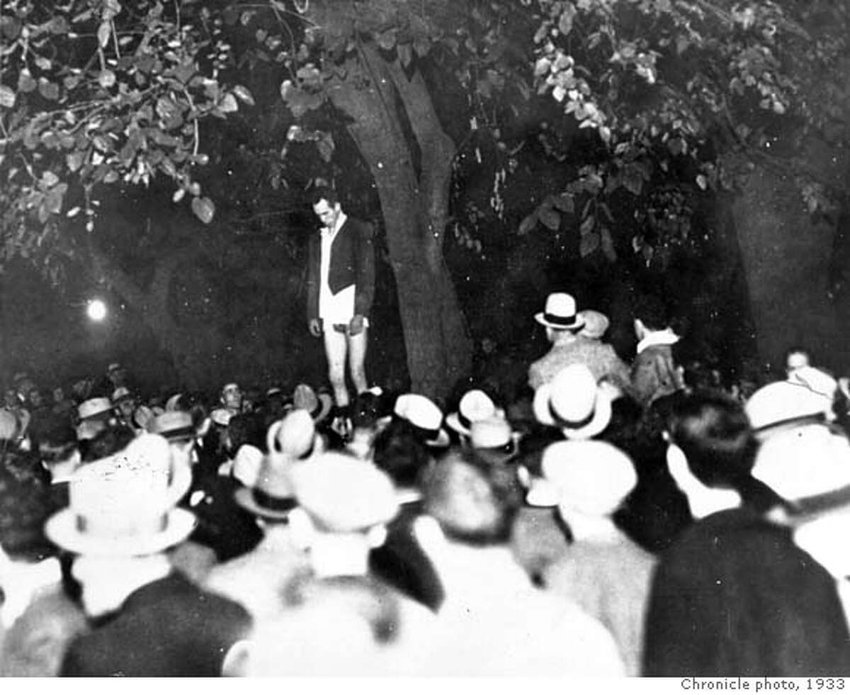 Jack Holmes hanging from a tree in St. James Park in San Jose, , 1933.