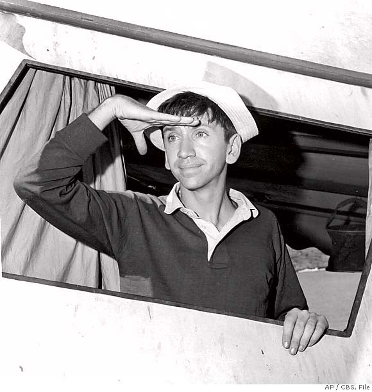 ** FILE ** In this Nov. 21, 1963 file photo released by CBS, Bob Denver, who plays the title role in the "Gilligan's Island" television comedy is seen. Denver died Friday, Sept. 2, 2005, at Wake Forest University Baptist Hospital in North Carolina of complications from treatment he was receiving for cancer, his agent said. He was 70. (AP Photo/CBS, File) A NOV 1963 B&W FILE PHOTO PROVIDED BY CBS . . MAGS OUT, ONLINE OUT INTERNET OUT NO ARCHIVES. NORTH AMERICA USE ONLY. ONE-TIME EDITORIAL NEWSPAPER USE ONLY. THIS IMAGE CANNOT BE ARCHIVED, SOLD, LEASED OR SHARED. THIS IMAGE CANNOT BE DISTRIBUTED