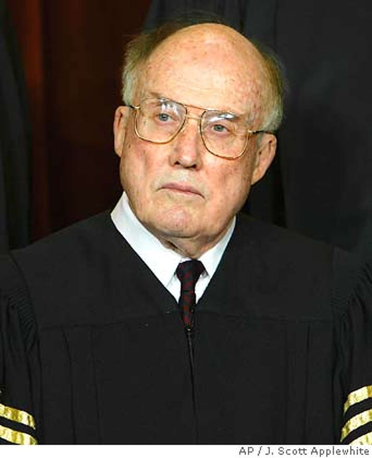 ** FILE ** Chief Justice of the United States William H. Rehnquist is seen in a file photo taken at the Supreme Court Building in Washington Dec. 05, 2003. Rehnquist has been hospitalized with thyroid cancer. (AP Photo/J. Scott Applewhite, File) Ran on: 10-26-2004 Chief Justice William Rehnquist, 80, underwent a tracheotomy over the weekend. Ran on: 10-26-2004 Chief Justice William Rehnquist, 80, underwent a tracheotomy over the weekend. Ran on: 11-14-2004 William Rehnquist, 80, was nominated by Richard Nixon and elevated by Ronald Reagan. Ran on: 11-14-2004 William Rehnquist, 80, was nominated by Richard Nixon and elevated by Ronald Reagan. DEC. 5, 2003 FILE PHOTO Ran on: 01-01-2005 William Rehnquist, chief justice, thanked those who have wished him a speedy recovery.