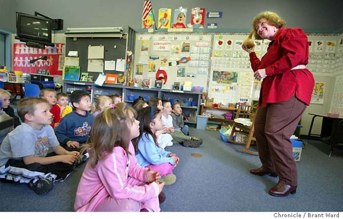 Cathryn Fairlee, veteran storyteller of the North Bay spins a tale to kindergarten students at Evergreen School in Rohnert Park BRANT WARD / The Chronicle