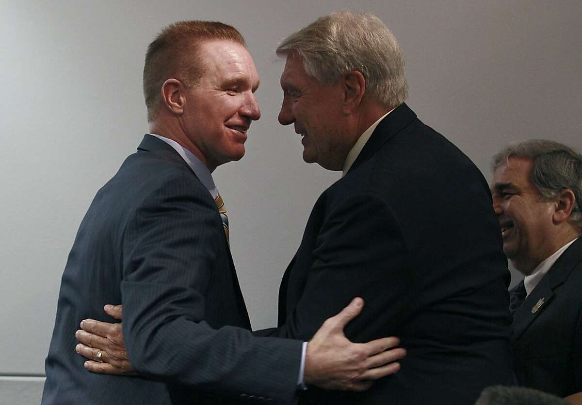 Former Golden State Warriors player Chris Mullin, left, greets former head coach Don Nelson at a news conference before an NBA basketball game between the Golden State Warriors and the Minnesota Timberwolves in Oakland, Calif., Monday, March 19, 2012. Mullin will have his Golden State Warriors jersey number 17 retired during a halftime ceremony. (AP Photo/Jeff Chiu)