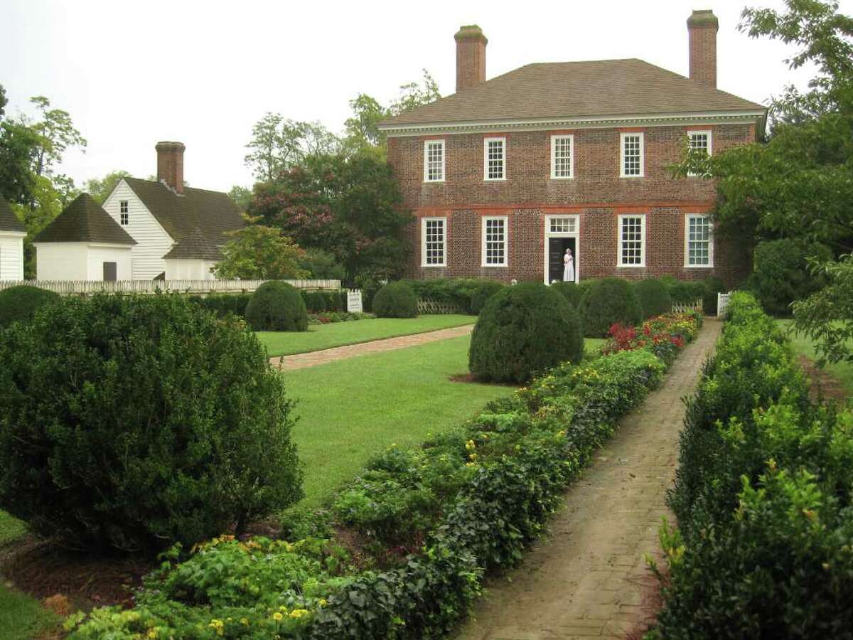 Inside the 1750's George Wythe home, visitors hear stories of Wythe, the first Virginia signer of the Declaration of Independence, and of his pupil Thomas Jefferson, who studied law there. .