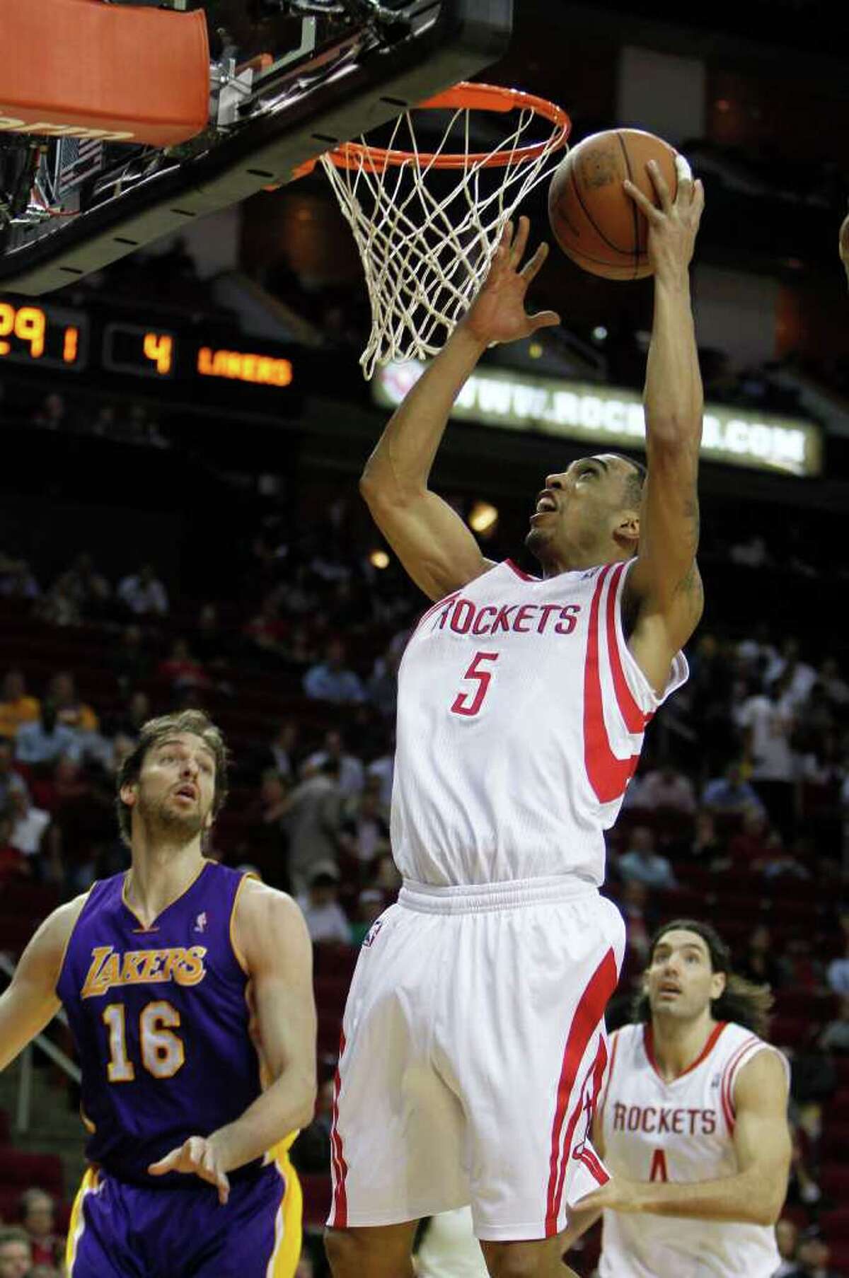 The Houston Rockets Courtney Lee shoots the ball against the Los Angeles Lakers during first the quarter of NBA game action at the Toyota Center Tuesday, March 20, 2012, in Houston.