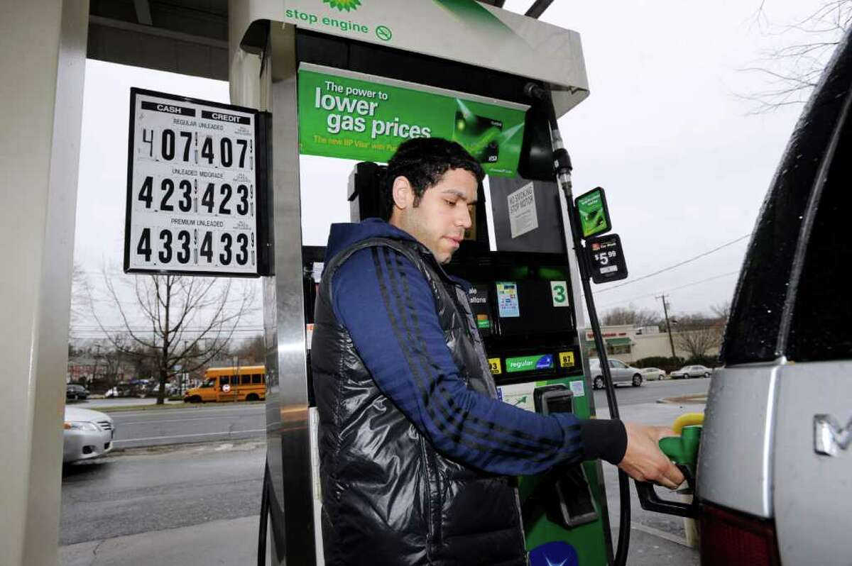 Greenwich native Steven Duque pumps gas at the Old Greenwich BP on the corner of East Putnam Avenue and Sound Beach Avenue March 1, 2012.