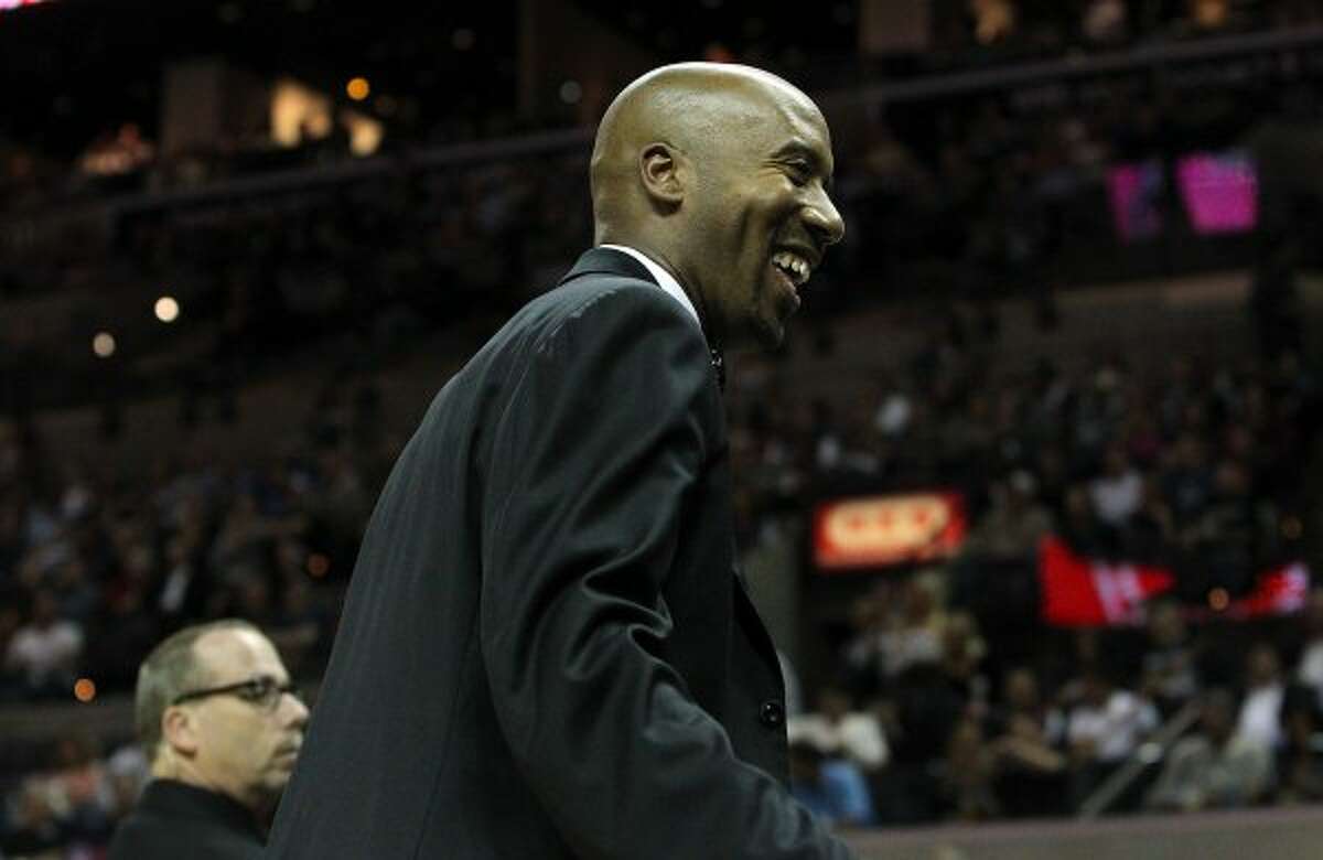 Former Spurs Bruce Bowen smiles at fans during a Spurs game against the Minnesota Timberwolves at the AT&T Center on Wednesday, Mar. 21, 2012. Bowen was honored during a jersey retirement ceremony. Kin Man Hui/Express-News. (San Antonio Express-News)