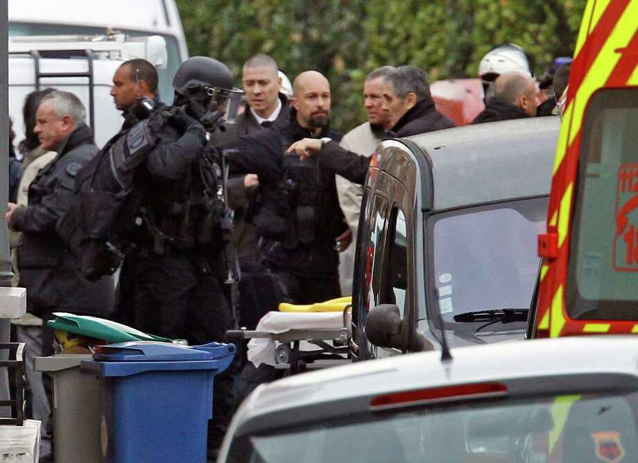 News Of The World In Photos: More Shooting In French Raid - Seattlepi.com