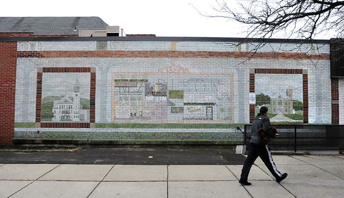 Mural on the side of CVS on the corner of Madison and Main Streets March 16 , 2012 in Albany, N.Y. There are efforts to restore the 35-year-old piece. (Lori Van Buren / Times Union)