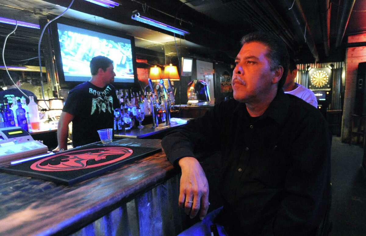 David Macias, godfather of Jessica Rodriguez, who died when the car she was sitting in was hit by an allegedly drunk driver, sits at The Basement Bar & Lounge during a fundraiser for Rodriguez and her daughter, Kaylee Flores, who also died as a result of the accident. March 22, 2012. Billy Calzada / San Antonio Express-News