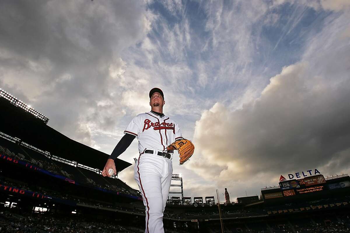In this photo taken, May 18, 2008, Atlanta Braves third baseman Chipper Jones walks off the field before the Braves faced off against the Oakland Athletics in a baseball game at Turner Field in Atlanta. Jones says this will be his final season. Jones, who turns 40 next month, issued a statement through the team Thursday, March 22, 2012, saying he will retire after the season. (AP Photo/Atlanta Journal-Constitution, Pouya Dianat)
