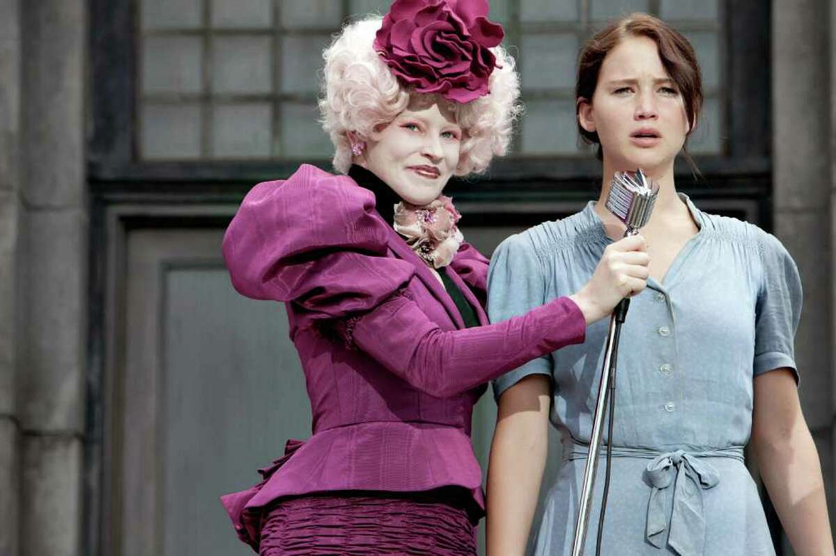 Effie Trinket (Elizabeth Banks, left) and Katniss Everdeen (Jennifer Lawren...