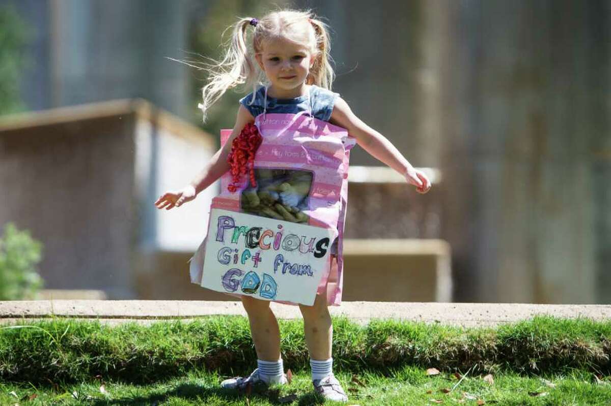 Valarey Knapp, 4, wears a sign during the Stand Up for Religious Freedom rally. The Stand Up for Religious Freedom event happened in about a dozen cities in Texas and more than a hundred nationwide, including Washington D.C. Organizers say the rally is not about conception or abortion, instead a defense of religious freedom and First Amendment protections.