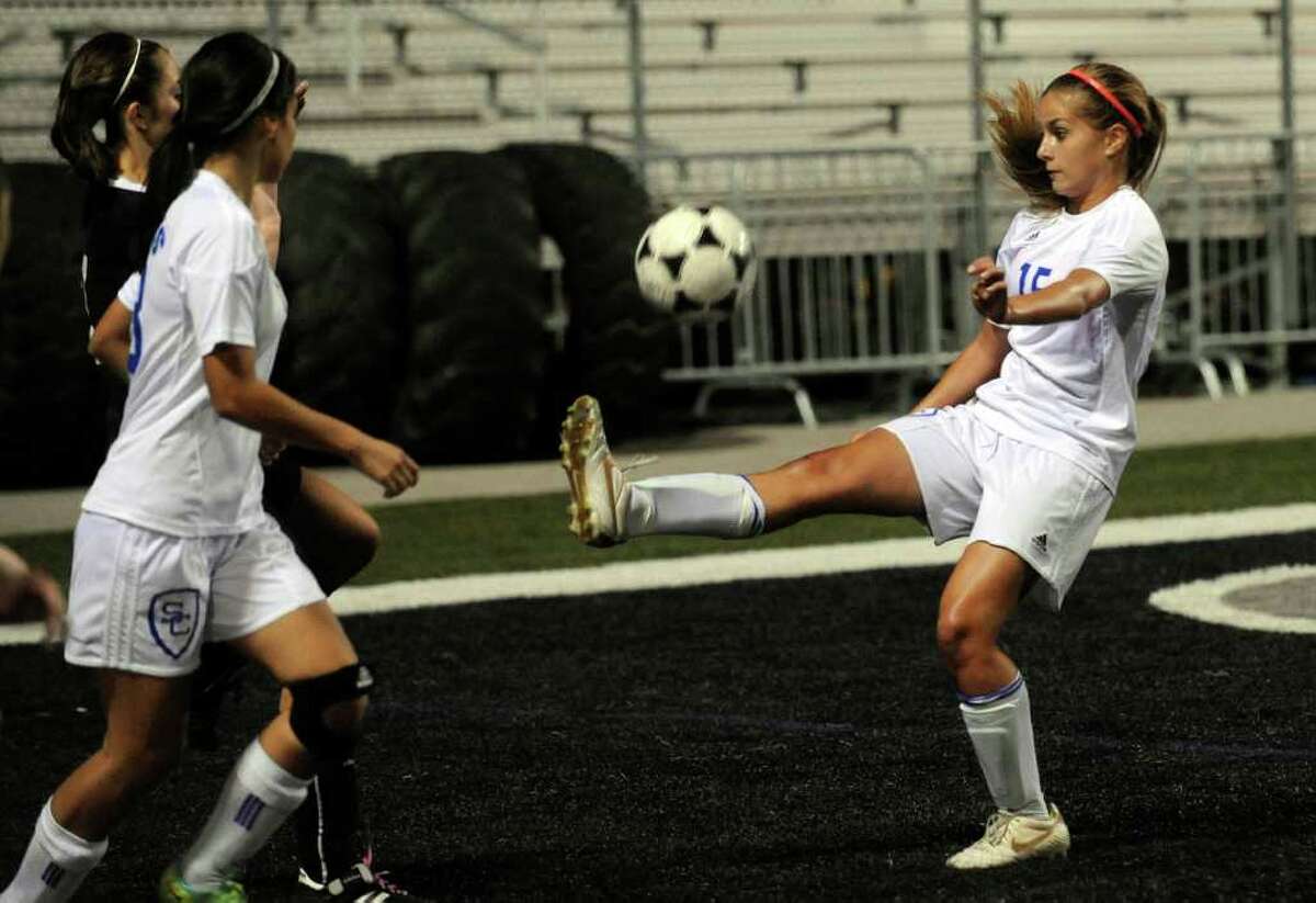 Emma Gibson of Clemens kicks the ball during soccer action against Smithson Valley at Clemens High School on Friday, March 23, 2012. Billy Calzada / San Antonio Express-News