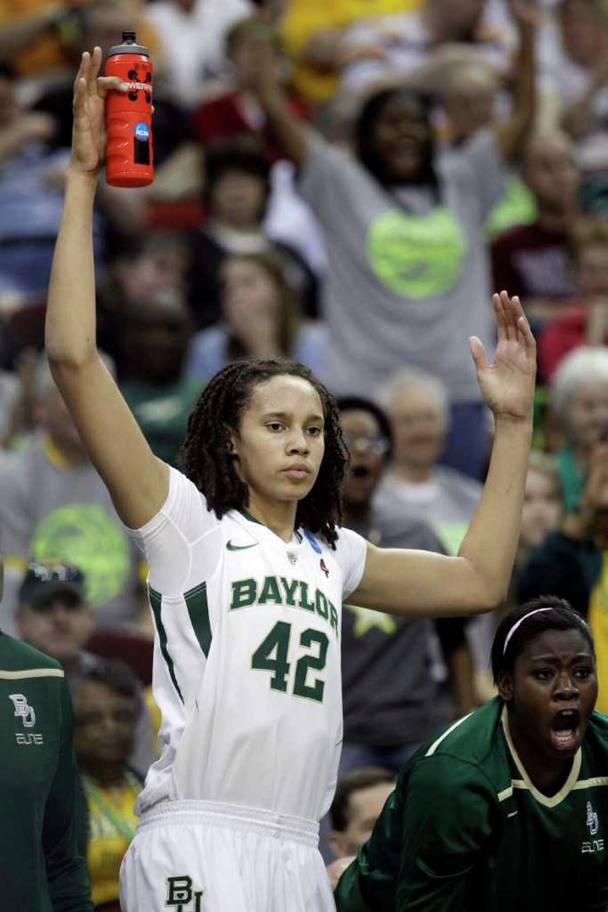 Baylor center Brittney Griner reacts on the bench during the first half of an NCAA women's tournament regional semifinal college basketball game against Georgia Tech, Saturday, March 24, 2012, in Des Moines, Iowa. (AP Photo/Charlie Neibergall)