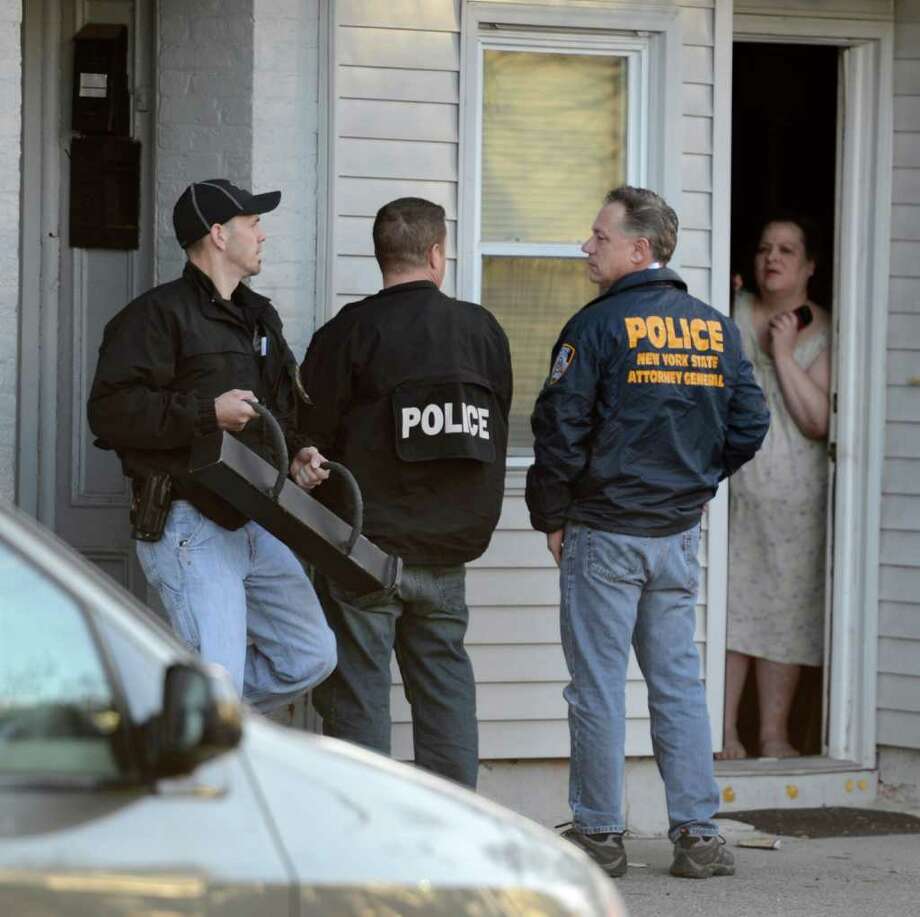 Dozens Face Charges After Gang Sweep - Times Union