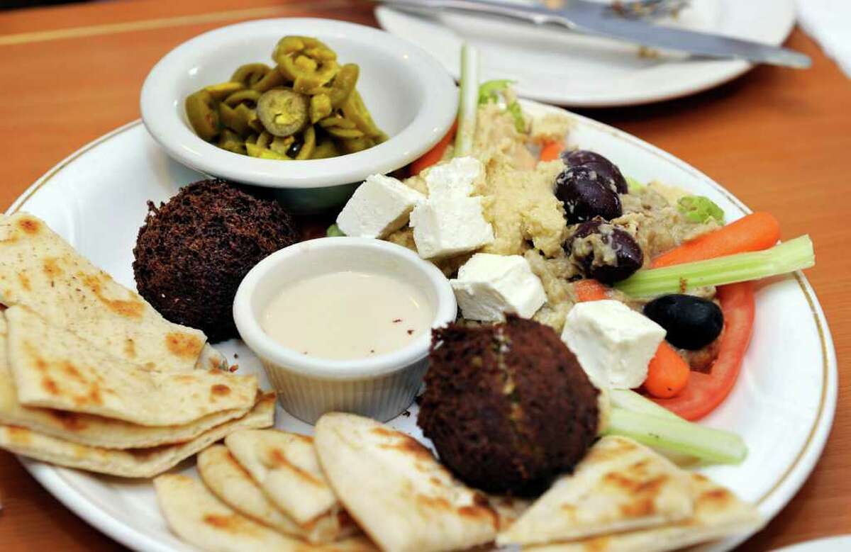 The New Station House, located in West Redding, serves a Mediterranean platter, which consists of falafel, hummous, baba ganoush and tahini.