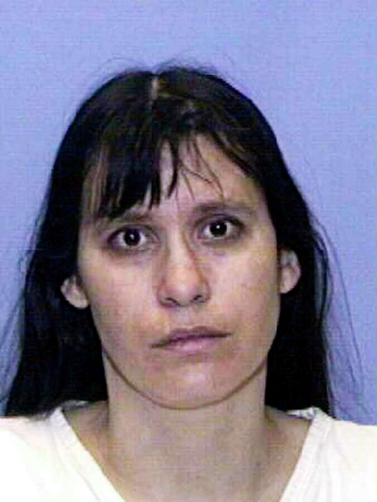 MARCH 21: (FILE PHOTO) Convicted child killer Andrea Yates is shown in this Texas Department of Criminal Justice handout photo March 21, 2002. Yates confessed to drowning her five children in a bathtub and was convicted on two counts of capital murder and sentenced to life in prison. A Texas Court of Criminal Appeals refused to reconsider a lower ruling that overturned the convictions of Yates on November 9, 2005 likely forcing a retrial of the case. (Photo by Texas Department of Criminal Justice via Getty Images)