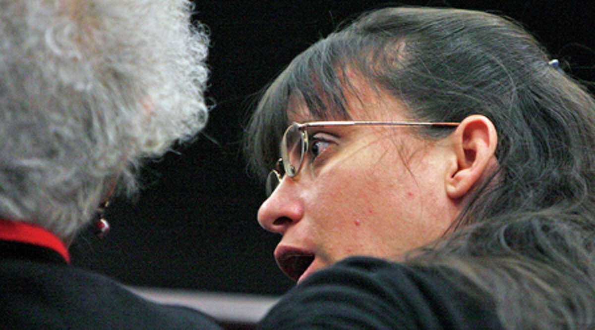 Andrea Yates, right, talks with her mother Jutta Karin Kennedy during a pre-trial hearing Wednesday, March 8, 2006 in Houston at the Harris County Criminal Justice Center. Yates' new capital murder trial is set to begin March 20. Yates was convicted in 2002 of capital murder in the drowning deaths of her children. The First Court of Appeals overturned that conviction because expert witness Park Dietz wrongly testified about an episode of the crime drama that mirrored the Yates case.