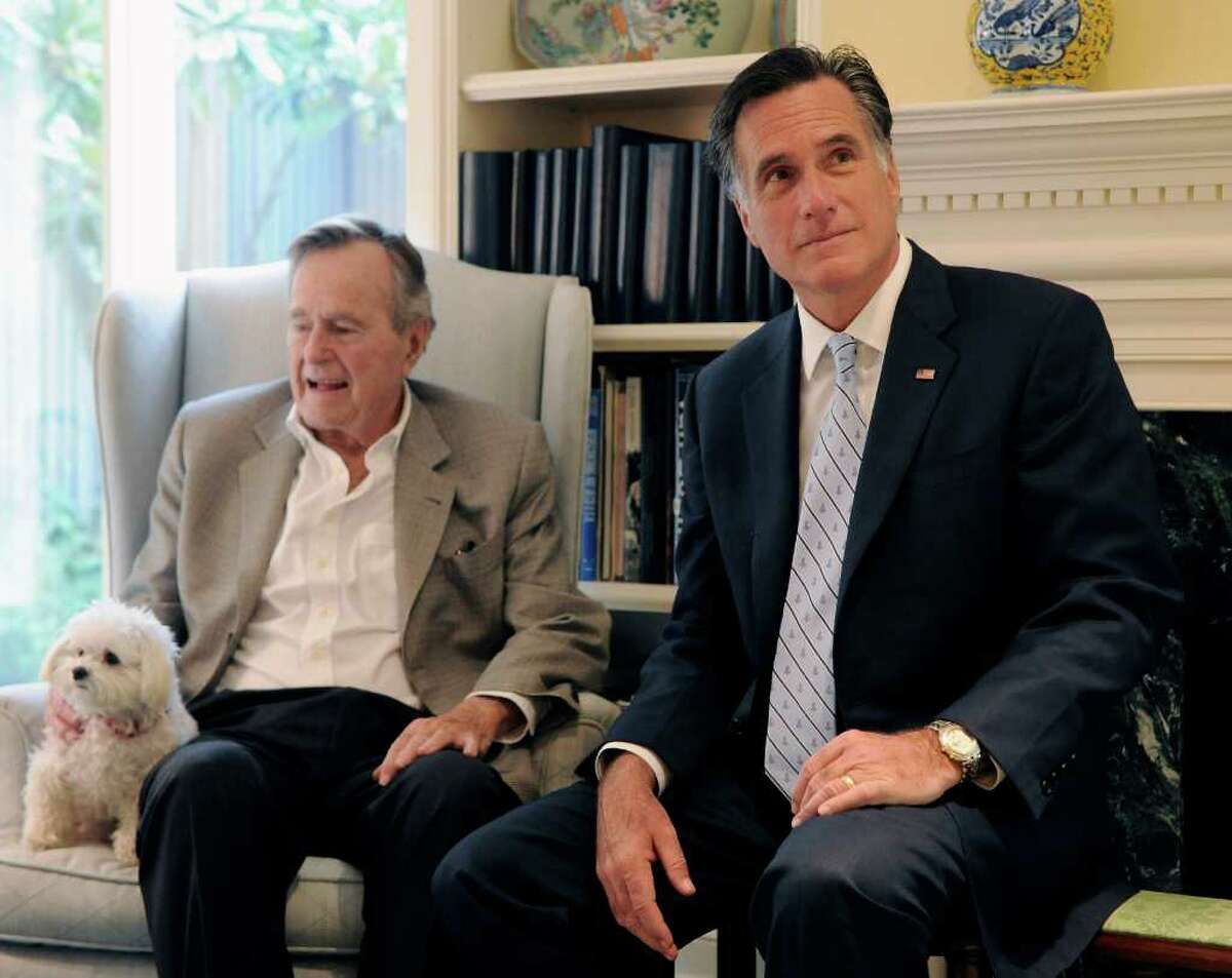 Former President George H.W. Bush, shown meeting Mitt Romney in December 2011, is set to formally endorse the GOP front-runner for president today.
