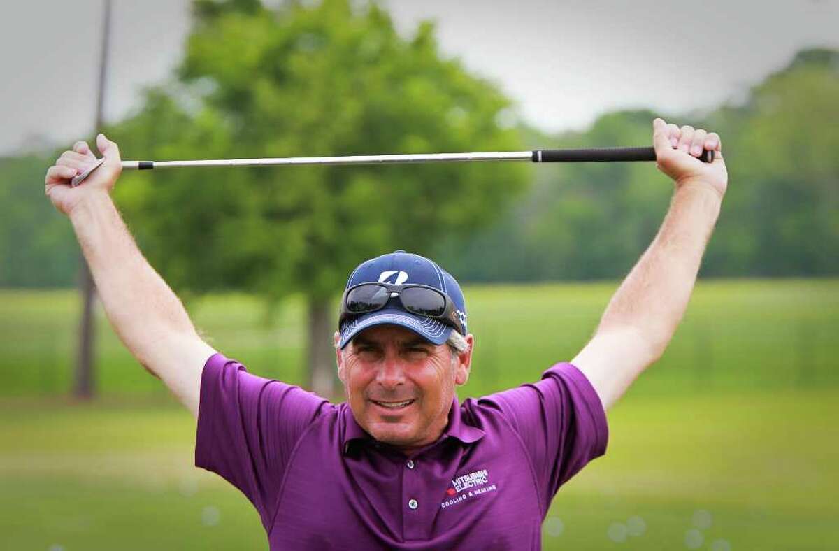 Fred Couples stretches as he warms up for the Grand Pro-Am during the Shell Houston Open, Wednesday, March 28, 2012, at the Redstone Golf Club in Humble. ( Nick de la Torre / Houston Chronicle )
