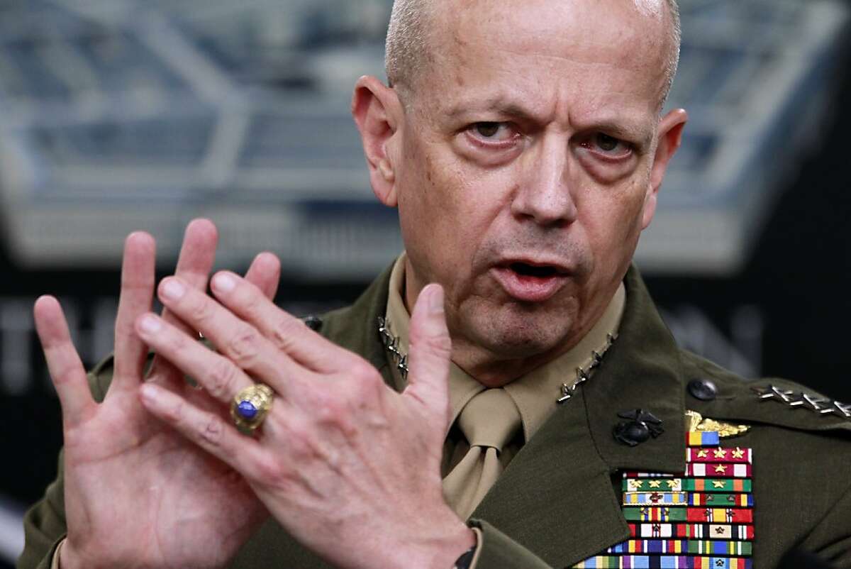 Marine Gen. John Allen, the top U.S. commander in Afghanistan gestures during a news conference at the Pentagon, Monday, March 26, 2012.