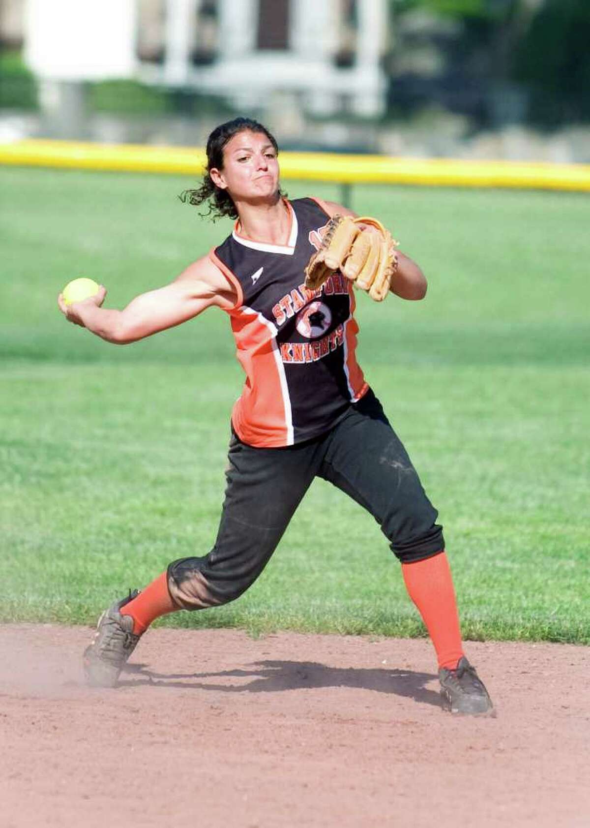 Stamford High School's Krista Robustelli makes a throw to first against Shelton High School during softball CIAC Class LL game in Stamford, Conn. on Tuesday May 31, 2011. Stamford won 9-3.
