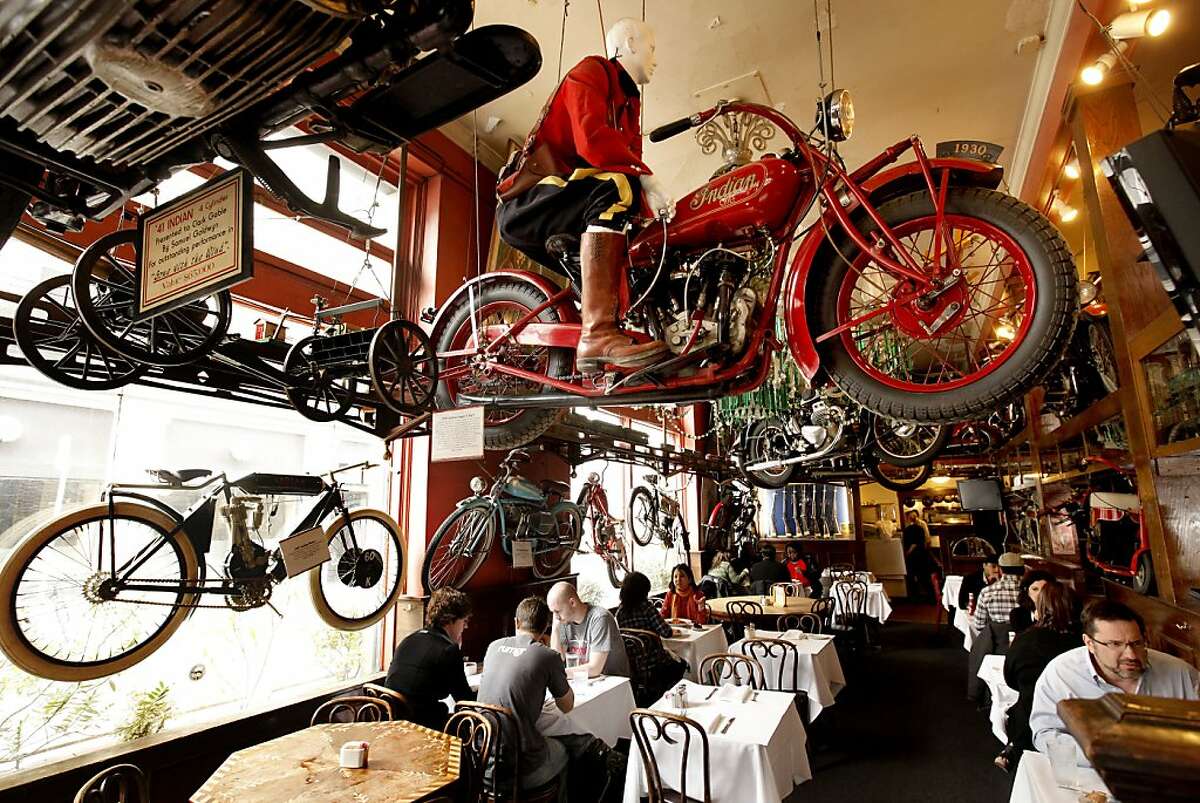 The dining area of Eddie Rickenbackers on Thursday March 29, 2012, in San Francisco, Ca. The popular bar is known for it's unusual decor of vintage motorcycles hanging from the ceiling and original Tiffany lamps lining the bar. Now all six lamps and one Tiffany chandelier are headed for Christie's auction house in New York, where they are expected to fetch more than $2 million.