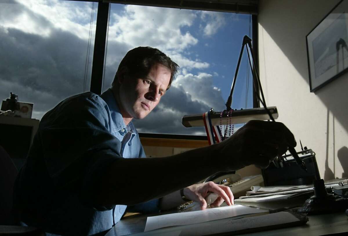 Sacramento Bee editorial cartoonist Rex Babin, seen here in this April 2003 file photo, whose piercing pen skewered presidents, governors and self-important legislators, died Friday at his home after a long battle with cancer. He was 49. (Sacramento Bee/MCT)