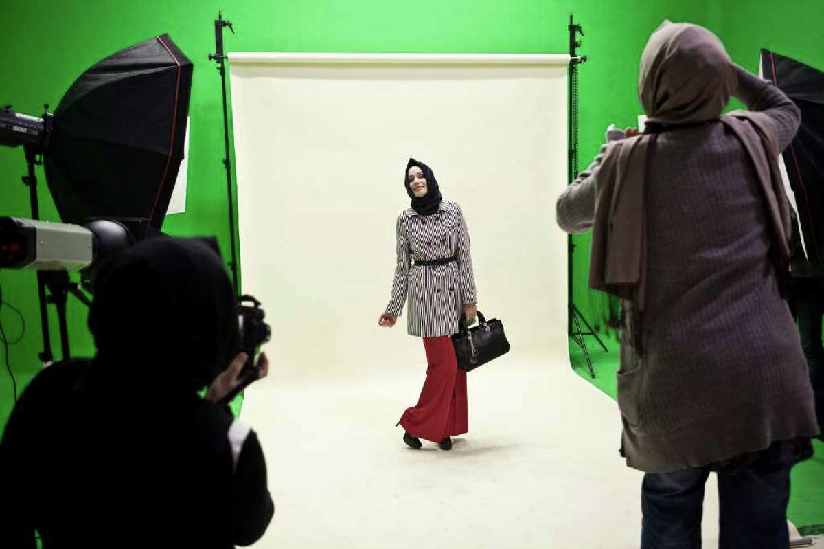 A Moldovan model poses at a photo shoot for the magazine Ala in Istanbul. Known as the "Vogue of the veiled" in the Turkish media, Ala unabashedly appeals to the pious head-scarf-wearing working woman.
