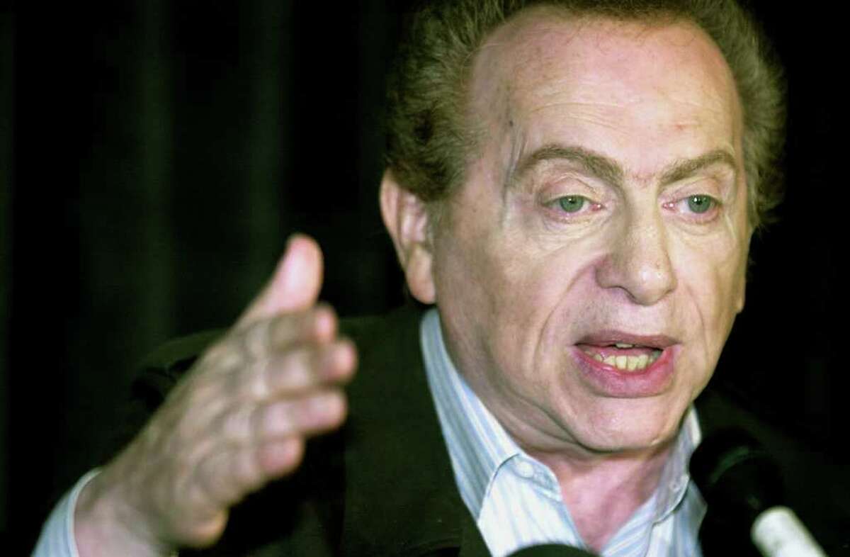 FILE- In this Aug 28, 2002, comic Jackie Mason addresses the media at a comedy club in Chicago. On Friday, March 30, 2012, New York City Police Commissioner Raymond Kelly said that the NYPD is investigating allegations that the comic roughed up a female companion. Kelly said the alleged altercation stemmed from a dispute. (AP Photo/Stephen J. Carrera, File)