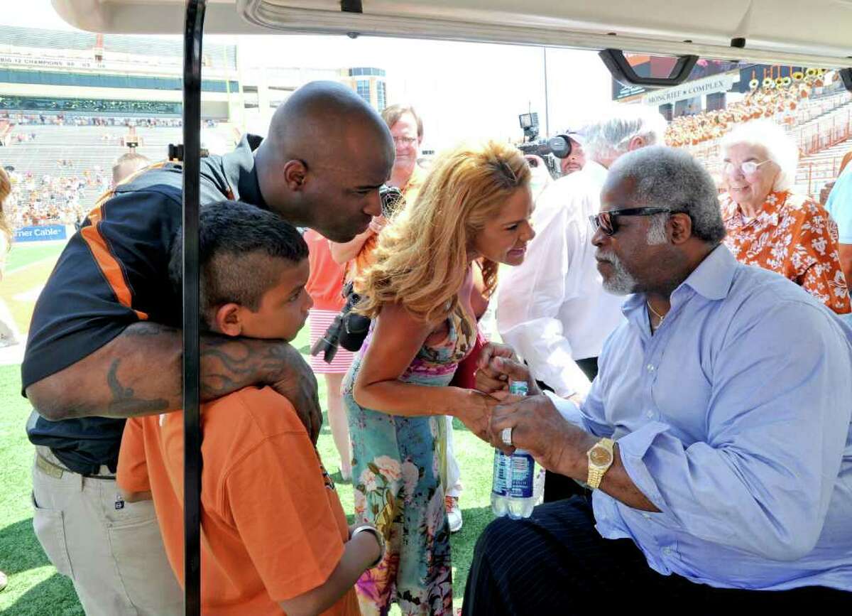 UT football greats Earl Campbell (right) and Ricky Williams will have their names on the field at the Longhorns' home stadium after changes announced by the school Monday following demands for change by Black student-athletes.