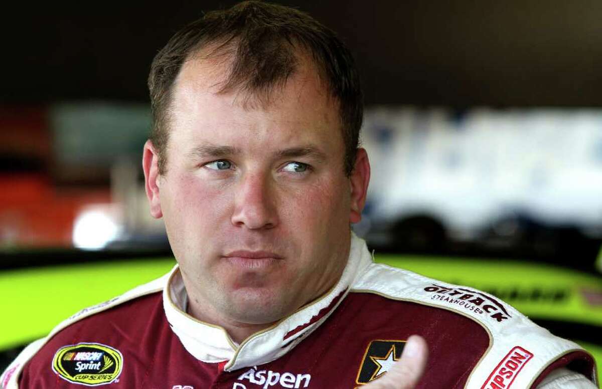 MARTINSVILLE, VA - MARCH 30: Ryan Newman, driver of the #39 Outback Steak House Chevrolet, looks on in the garage area during practice for the NASCAR Sprint Cup Series Goody's Fast Relief 500 at Martinsville Speedway on March 30, 2012 in Martinsville, Virginia. (Photo by Jerry Markland/Getty Images for NASCAR)