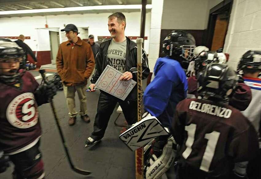 Dr. Wally Bzdell, a psychologist who's been working closely this season with the Union hockey team works with a youth hockey team at Union College Thursday March 29, 2012 in Schenectady, N.Y. (Lori Van Buren / Times Union)