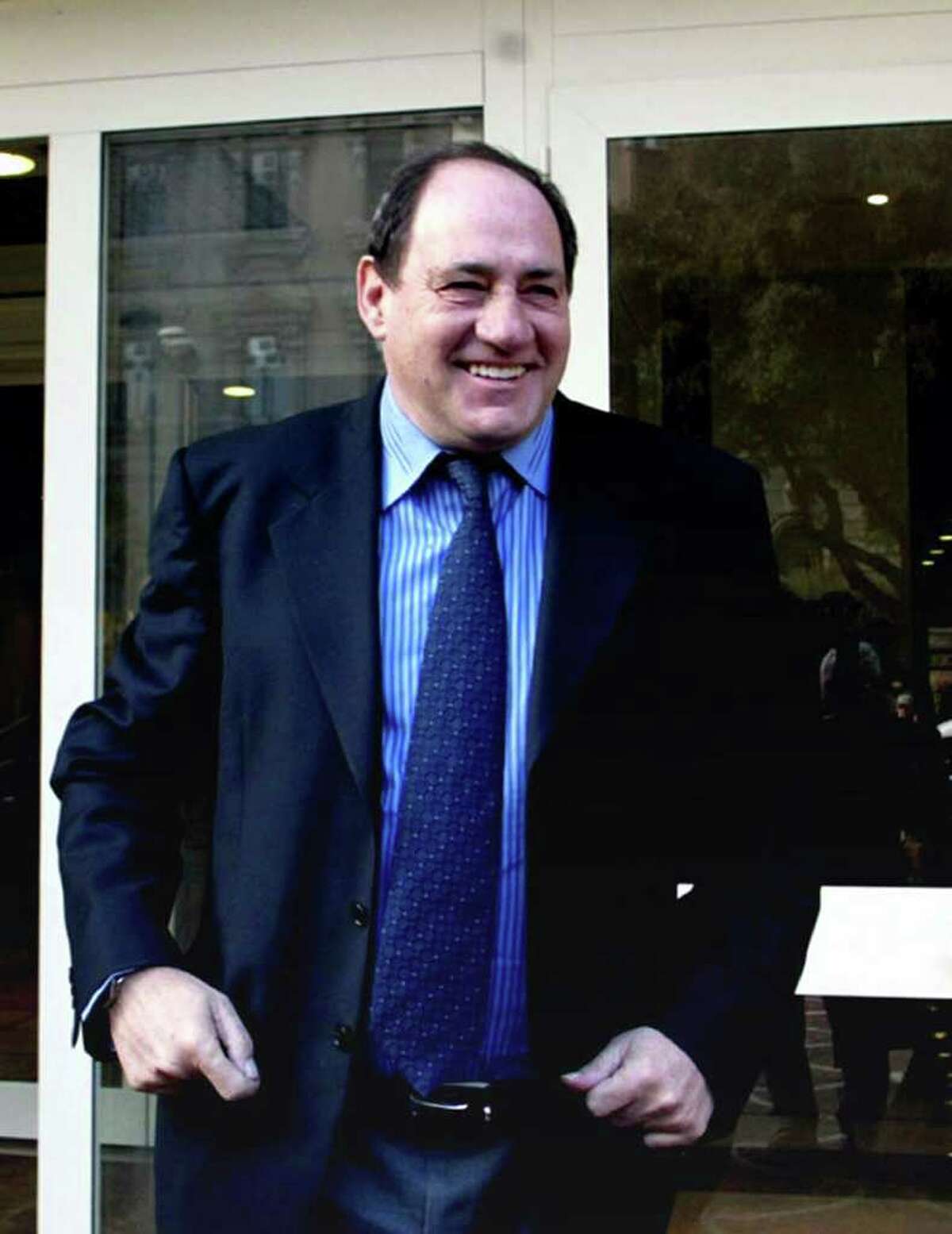 FILE - In this March 13, 2006, file photo, former Lazio player Giorgio Chinaglia stands outside the Italian Market Regulator office in Rome, Italy. Former Italy and Cosmos star Chinaglia died in his home in Florida, Sunday, April 1, 2012, his son Anthony Chinaglia said. (AP Photo/Giuseppe Calzuola, File)