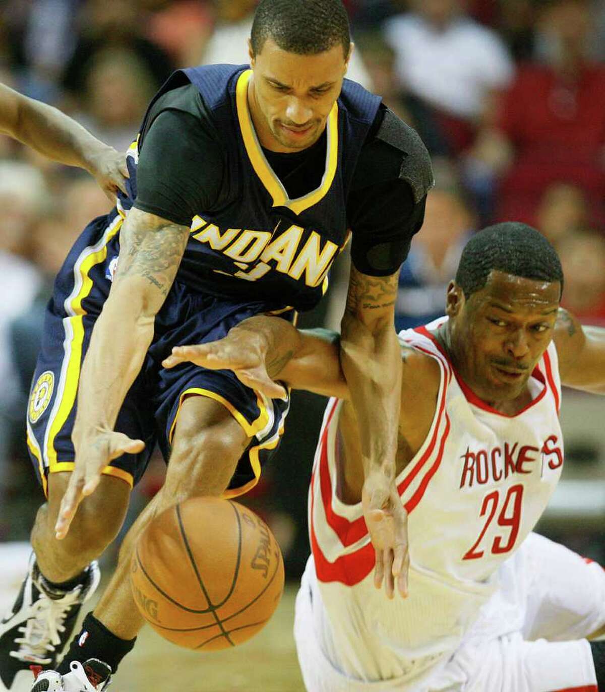 Akin to this steal by George Hill, left, against Marcus Camby, a win slipped away from the Rockets.