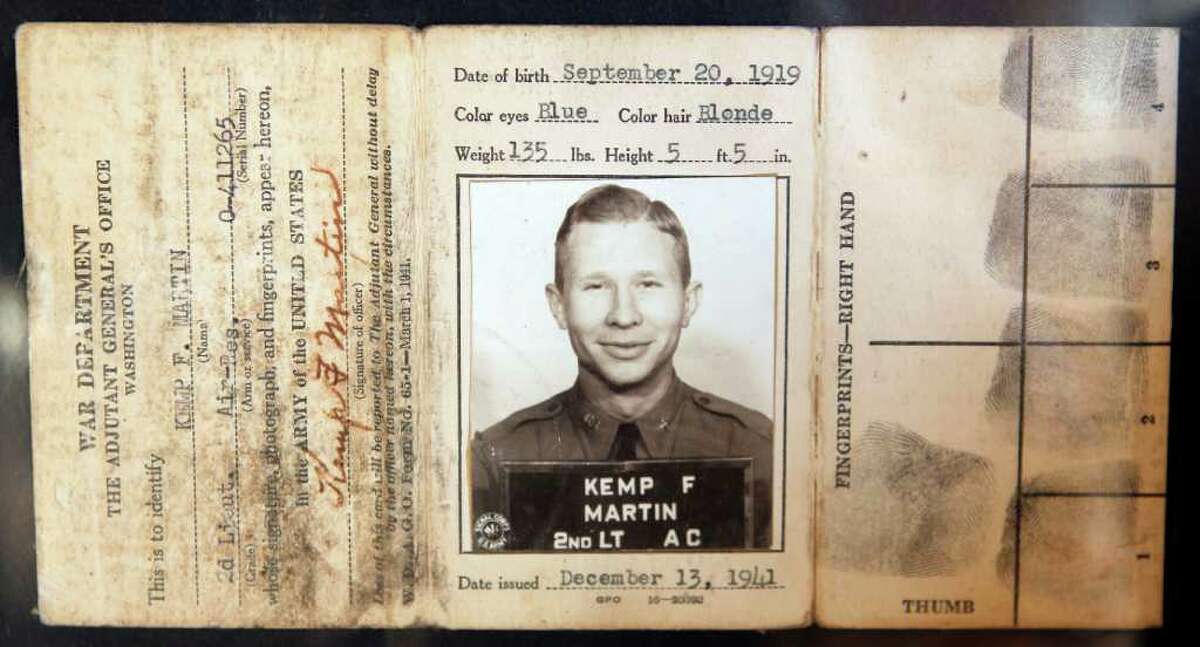 An identification card for Kemp F. Martin who navigated a B-17 bomber in WWII which was shot down over Italy. Pieces of the plane had been sent by Italian researchers who recently discovered the wreckage of Martin's plane to his daughter and wife Tuesday, March 27, 2012, in Houston. ( James Nielsen / Chronicle )