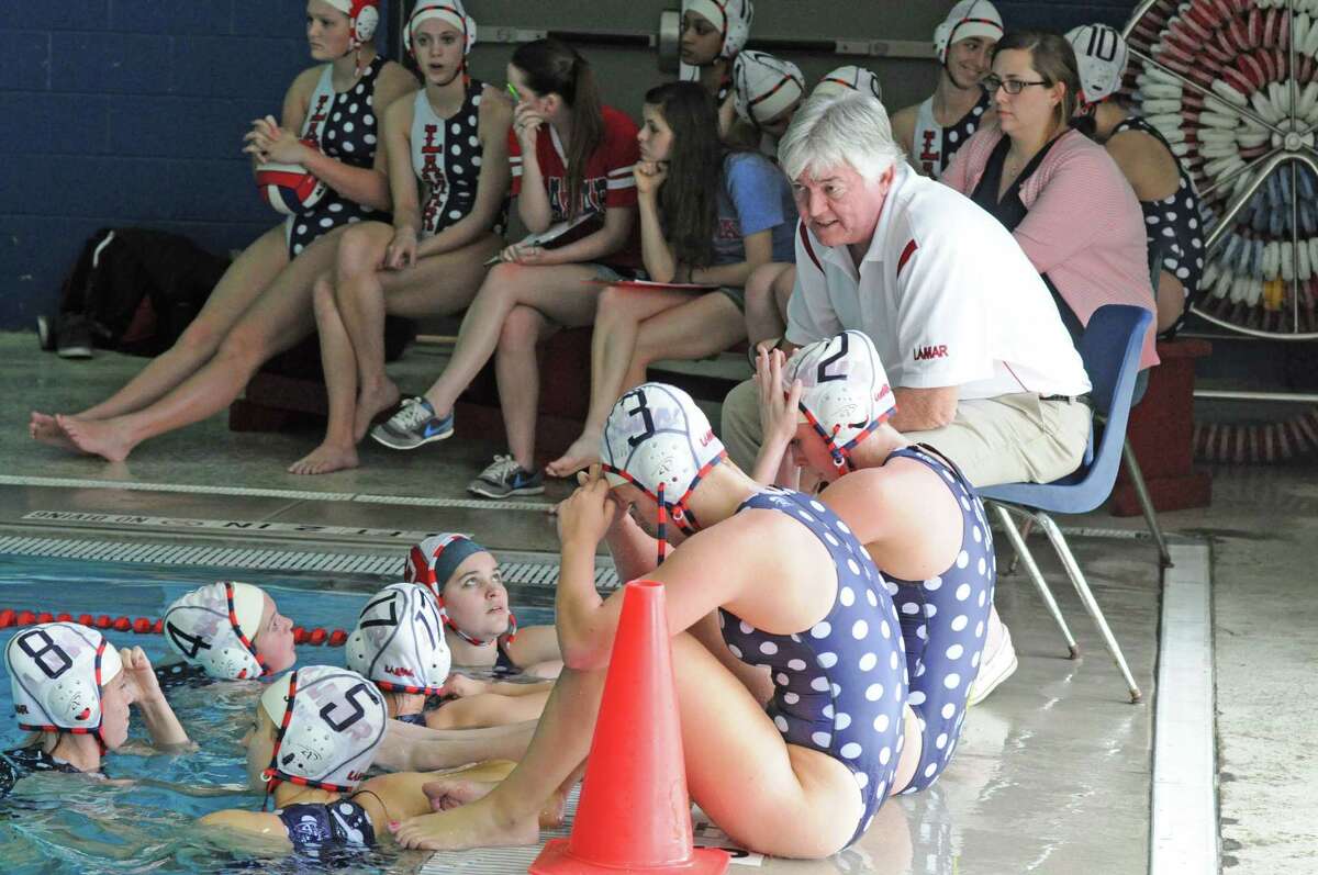 Lamar water polo coach Mac McDonald with the Lady Redskins during the 17th annual Wyatt Earp Showdown on March 30, 2012 at Clear Lake High School.