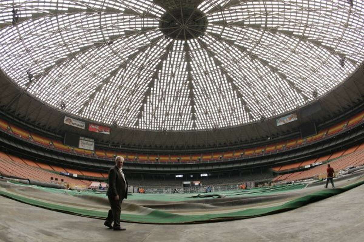 Mark Miller, left, general manger of Reliant Park, lead a media tour of the Reliant Astrodome Tuesday, April 3, 2012, in Houston. (Melissa Phillip / Houston Chronicle)