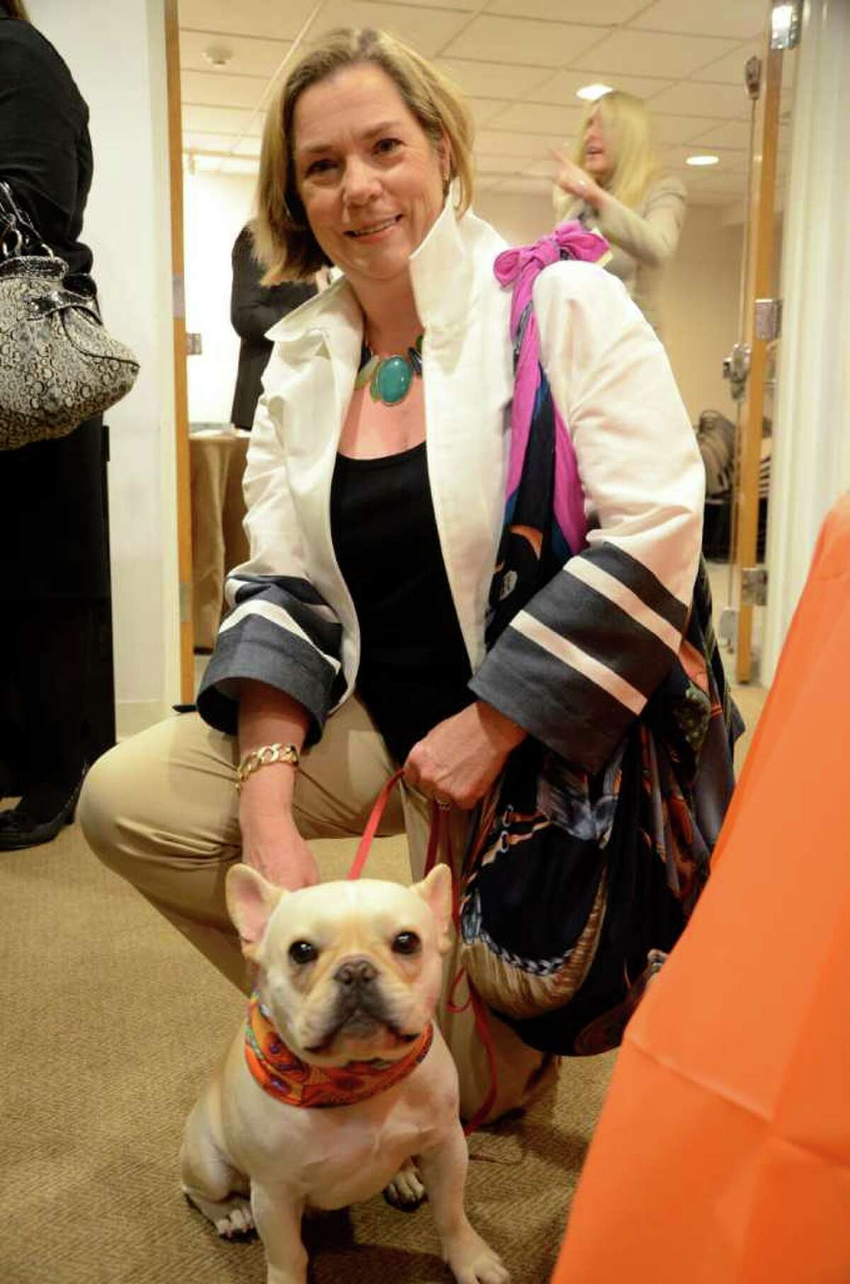 Two of the models of the evening: Anda Hutchins carrying her Hermes hobo bag, and her french bulldog Calvin, sporting an Hermes collar!