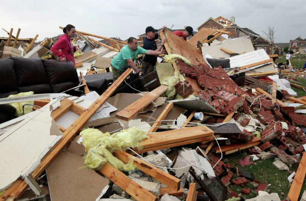 News of the world in photos: Tornadoes and destruction in Texas