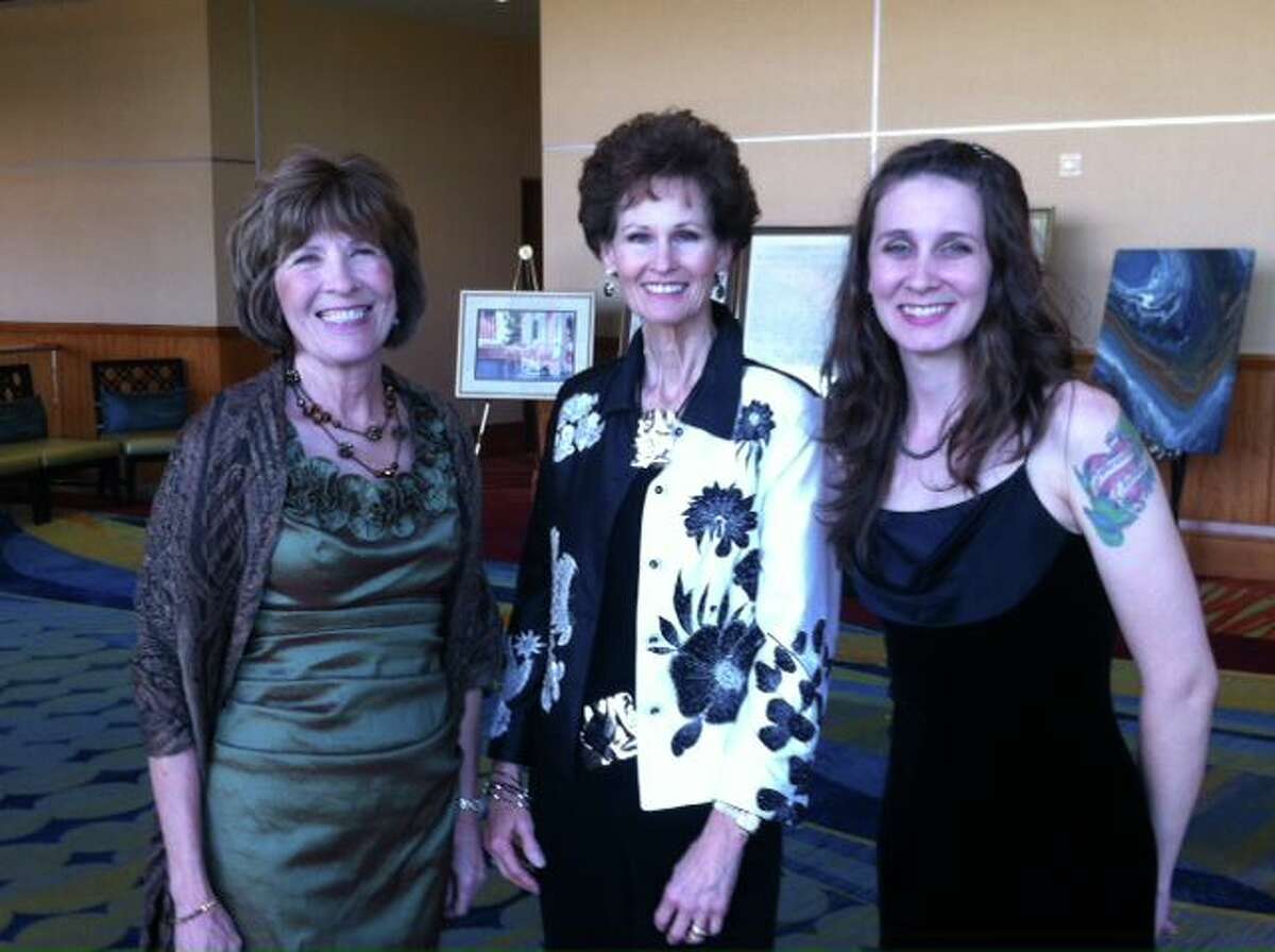 Pictured from left are PACN Conroe Center Director Sandy Ridgeway and volunteers Claudia Riedlinger and Sarah Bolen.