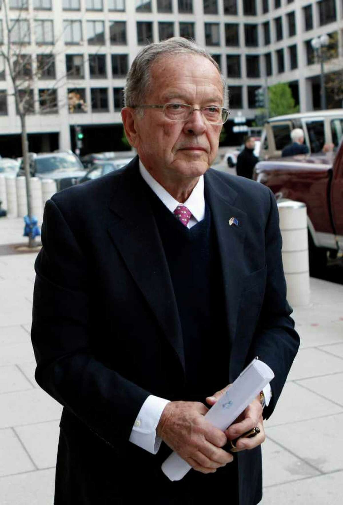 FILE - In this April 7, 2009 file photo, former Alaska Sen. Ted Stevens, R-Alaska, arrives at federal court in Washington. A report on misconduct in the Justice Department released Thursday paints a picture of a rudderless and sometimes dysfunctional public corruption unit under the man who has since become the face of President Barack Obama's effort to crack down on officials who leak government secrets.