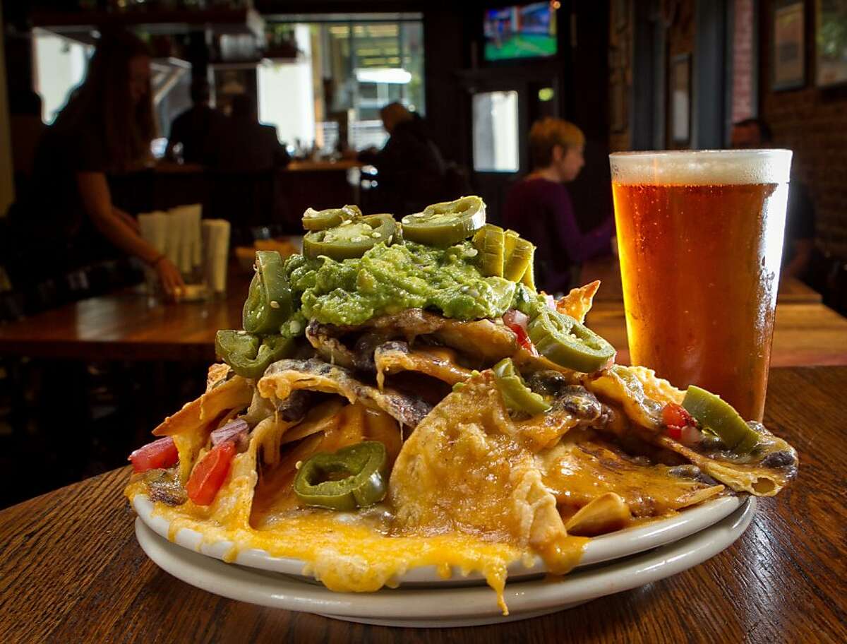 The Old Ship Nachos with a Poppy Jasper Amber Ale at the Old Ship Saloon in San Francisco, Calif., is seen on Monday April 2nd, 2012.